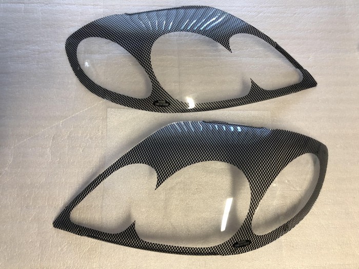 Защита передних фар карбон Toyota Corolla Е120 2004-2006 Седан Универсал EGR1049CF